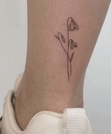 Snowdrop Tattoo Minimalist, Tiny Snowdrop Tattoo, Flower Tattoo Simple Minimalist, Snowdrop Line Tattoo, Fine Line Tattoo Snowdrop, Snow Drop And Poppy Tattoo, Snowdrop And Poppy Flower Tattoo, Small Snowdrop Tattoo, Galanthus Tattoo