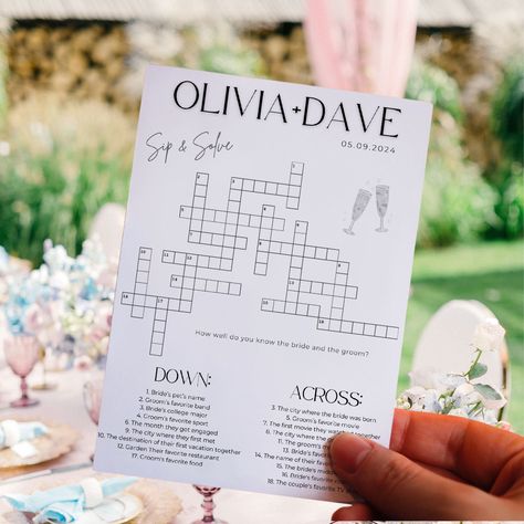 Custom Wedding Crossword Puzzle- Bridal Shower Sip and Solve Questions, Printable Engagement Guest Table Games, Editable Canva Template SEE SIMILAR ITEMS & DIFFERENT SIZES HERE: https://www.etsy.com/shop/DigitalCreationsByGG?ref=dashboard-header&search_query=crossword Make your wedding, bridal shower or engagement party unforgettable with our custom crossword puzzle! This unique and fun activity is perfect for entertaining your guests as they sip, solve, and celebrate your special day.  Features: - Interactive Entertainment: Keep your guests engaged with a delightful crossword puzzle filled with personalized questions about the bride and groom. - Perfect Size: The 5x7" size makes it easy to place at each guest's seat or display on a guest table. - Editable Template: Customize the questions Sip And Solve, Wedding Crossword Puzzle, Guest Table, Dashboard Header, Wedding 2025, Getting Engaged, Crossword Puzzle, Table Games, Printable Designs