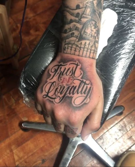 Trust N Loyalty Tattoo Hand, Loyalty Rose Tattoo, Trust N Loyalty Tattoo, Hand Qoute Tattoo, Chest Tattoo Men Ideas One Side, Trust And Loyalty Tattoos, Loyalty Hand Tattoos For Guys, Hand Tattoos Cute, Men’s Hand Tattoos