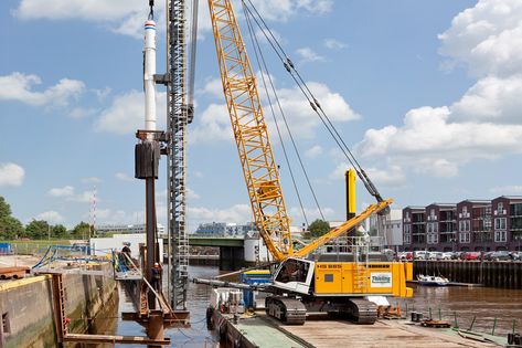 A pile driver is a heavy-duty piece of machinery that is extremely effective at driving timber, metal, and reinforced concrete piles into the ground. This is normally done to establish a firm footing on which a building or other structure’s foundation can rest upon. For more information call us today 816-221-4774! #piledrivingequipment #vibratoryhammers #constructionequipment Cranes For Sale, Pile Driver, Shanghai City, Crawler Crane, Noise Dampening, Truck Cranes, Industrial Equipment, Construction Types, Reinforced Concrete