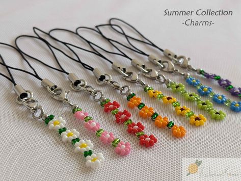 "🌻These bright and colorful charms add an eye-catching pop to your bags, backpacks, phones, and anywhere else you can put a charm!🌻 🌻SUMMER COLLECTION🌻 Inspired by summer's showy blossoms, these brightly-colored glass beads give the flowers in these charms a striking and bold pop of color. * Flowers in this collection include * - Daisy (white) - Petunia (pink) - Verbena (red) - Begonia (orange) - Sunflower (yellow) - Nicotiana (light green) - Morning Glory (light blue) - Balloon Flower (purple) * Handcrafted by me (Kala)! * Each charm is made with great care and quality materials sourced from fellow sellers and neighboring small businesses. * Mix-and-match with charms from other collections to make your favorite color combo and flower messages. * OPTIONAL UPGRADE: Swap out the default Seed Bead Keychains, Seed Bead Phone Charm, Beaded Bag Charm, How To Make Phone Charms, Phone Charms Beads, Flower Messages, Seed Bead Keychain, Red Begonia, Beaded Phone Charms