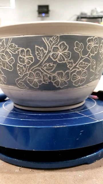 Richard Martin on Instagram: "Attempting a cherry 🌸 on this planter. I don't know if it looks like one though 😆😆😆. Anyway, this is waht I am doing while listening to the winds outside on this stormy day. #indoorplantsdecor #sgraffito #sgraffitopottery #diamondcoretools #stonewarepottery #potterylover #herbplanters #ceramicplanter #handmadeplanter #succulentplanter #handmadepots #springplanting #handmadeceramics" Sgraffito Pottery Pattern Ideas, Scrifito Ceramics, Sgraffito Designs Flowers, Ceramic Sgraffito Ideas, Sgraffito Bowl Designs, Scraffito Designs Simple Bowl, Pottery Glaze Designs, Ceramic Scrafitto, Scrafitto Pottery