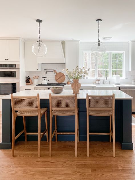 Kitchen stools, sherwin williams pure white kitchen, globe pendants Kitchen Navy Island, White Kitchen Navy Island, White Kitchen Bar Stools, Kitchen Navy, Navy Island, Modern Boho Kitchen, Coastal Farmhouse Kitchen, Coastal Farmhouse Decor, Bar Stools Kitchen Island