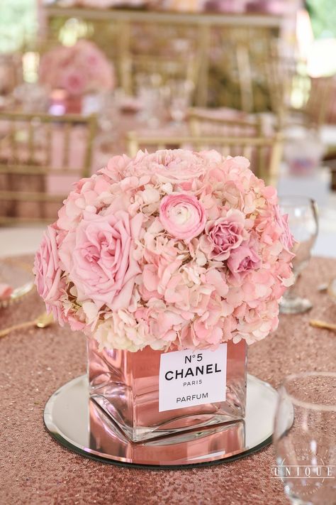 Bouquet Of Flowers Centerpiece, Pink Theme Centerpieces, Perfume Bottle Centerpiece, Dior Centerpieces, 50th Birthday Flowers Arrangements, 30th Birthday Centerpiece For Her, Chanel Centerpiece Ideas, Flower Centerpieces For Party, Fashion Centerpieces