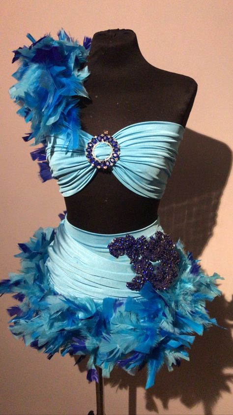 Turquoise two piece set decorated with turquoise and blue feather boa and diamond decoration on top Feather 2 Piece Outfit, Rio Inspired Outfit, Rio Themed Party Outfit, Miami Carnival Outfit, Samba Dance Costume, Carribean Carnival Outfits, Carnival Outfit Brazil, Peacock Inspired Outfit, Blue Dance Outfit