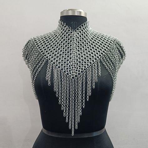 ❋ Chainmail Tops Now on Sale! ✨ Elevate your look with our stunning chainmail tops, now available at a special price! These unique pieces add a touch of metallic flair to any outfit, perfect for festivals, renaissance fairs, or everyday wear. • Website Link in Bio #chainmailtop #metallicfashion #festivalstyle #renaissancefair #statementpiece #shopnow Female Chainmail Armor, Chainmail Clothing Diy, Fantasy Chainmail, Chainmail Accessories, Evil Cleric, Chainmail Projects, Druid Wedding, Chain Mail Shirt, Chainmail Clothing