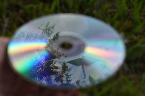 Sky, Tree and Origami through CD reflection Reflection Photography Ideas At Home, 2 Faced Drawing, Shiny Photography, Reflection Photography Ideas, Cd Photography, Reflective Photography, Objects Photography, Distortion Photography, Photo Hacks