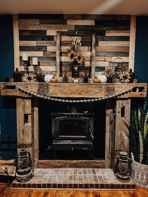 3D wood stained reclaimed wood with barn wood beams.  Fall Decor.  Farmhouse mantle Fireplace Mantle Decor Western, Rustic Wood Fireplace Surround, Small Fake Fireplace Ideas, Pallet Stove Ideas, Western Fireplace Ideas, Cabin Mantle Decor Rustic, Reclaimed Wood Fireplace Surround, Western Fireplace Decor, Rustic Wood Stove Surround