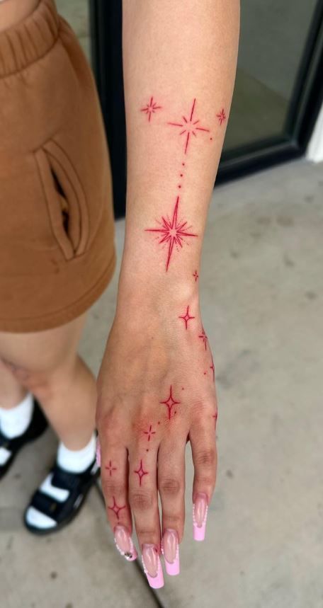 Red And Black Tattoo Ideas For Men, Red Tatoos Woman, Back Hand Tattoos For Women, Red Hand Tattoo For Women, Red Tattoo Hand, Tattoos With Red Ink, Small Tattoo Ideas Women, Red Tattoos On Dark Skin, Red Minimalist Tattoo