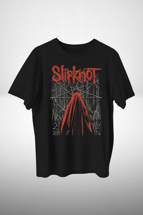 Unleash your inner metalhead with this Slipknot Oversized Vintage Metal T-Shirt. Featuring an iconic Slipknot graphic design, this shirt showcases the raw intensity and dark aesthetic that the band is known for. The bold red and black color scheme, along with distressed artwork, gives the t-shirt a vintage feel, making it a perfect addition for any fan of heavy metal and alternative rock. Crafted from soft, durable cotton, this oversized t-shirt offers both comfort and style. Its relaxed fit ens Distressed Artwork, Metal Band Shirts, Metal T Shirt, Metal T Shirts, Slipknot, Alternative Rock, Metal Band, Band Shirts, Oversized T Shirt