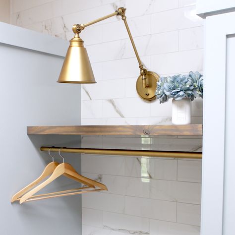 laundry-room-gold-sconce-light-diy-marble-wall-tile-rustic-shelves Laundry Room Ideas Small Space, Marble Wall Tiles, Laundry Room Renovation, Diy Marble, Laundry Room Cabinets, Laundry Room Inspiration, Shaker Style Doors, Laundry Room Diy, Diy Tile