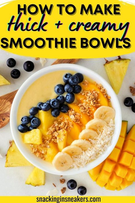 A thick mango smoothie bowl topped with fruit, granola, and coconut. Thick Smoothie Bowls Recipes, Smoothie King Bowl, Tropical Smoothie Bowl Recipe, Mango Bowl Recipe, Banana Base Smoothie Bowl, Smoothie Bowl Base Recipe, Ninja Smoothie Bowl Recipes, Mango Smoothie Bowl Recipes, Acia Bowls How To Make