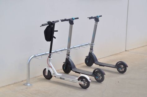 Scooter Rack | Parking lot for scooters Electric Scooter Storage Garage, Electric Scooter Storage, Scooter Rack, Scooter Parking, Scooter Store, Scooter Storage, Scooter Rental, Bicycle Rack, Bike Lock