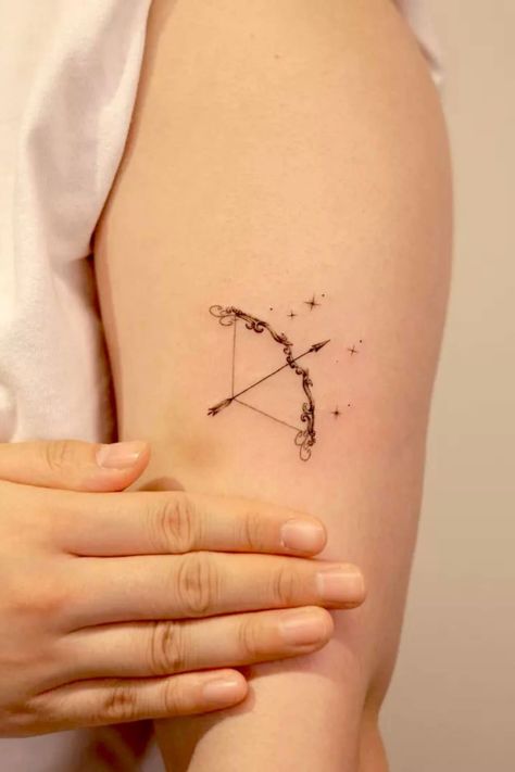 Dainty Archer Tattoo, Sagittarius Archer Tattoo Women, Tattoo Ideas Saggitarius, Tiny Archer Tattoo, Artemis Bow And Arrow Tattoo, Fantasy Minimalist Tattoo, How And Arrow Tattoo, Fine Line Bow And Arrow Tattoo, Archer Sagittarius Tattoo