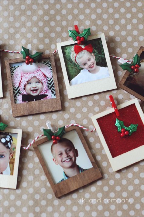 Polaroid Picture Garland {Christmas Gift Tutorial}. LOVE this idea for a gift or decor! #MichaelsChristmas Kid Ornament Craft Picture, Diy Photo Frame Ornaments, Kids Ornament Craft Picture, Handmade Photo Ornaments, Picture Christmas Ornaments Diy, School Picture Ornaments, Homemade Picture Ornaments, Polaroid Christmas Ornament, Picture Ornaments Diy