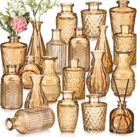 PRICES MAY VARY. Rich in Quantity: this package comes with 20 pieces of small centerpiece vases in 10 styles, the quantity is sufficient to meet your home decoration needs, you can also share them with others; Each vase is firmly wrapped in the thick boxes to avoid breakage in transit Retro Design: the glass vases for centerpieces are decorated with etching patterns, look retro and elegant, they will become the delicate centerpieces for the window, dining or wedding table Easy to Store and Displ Centerpieces Rustic, Vases For Centerpieces, Glass Vases Centerpieces, Vases For Flowers, Short Vase, Small Vases, Small Glass Vases, Glass Bud Vase, Look Retro