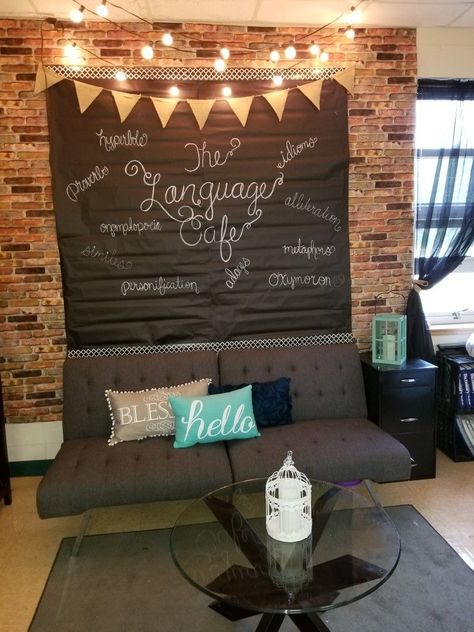 Coffee Themed Classroom Ideas, Cafe Lights In Classroom, Classroom Rustic Decor, Cafe In Classroom, Urban Classroom Decor, Classroom Couch Area, Classroom Decor With Lights, Creative Writing Classroom Decor, Brick Bulletin Board Ideas