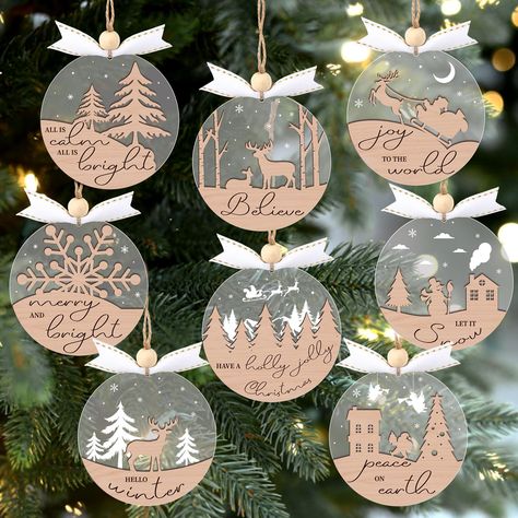 PRICES MAY VARY. VALUABLE PACKAGE:You will get 16pcs winter themed ornaments Christmas tree decorations, each measures 2.95” in diameter, including 16pcs hanging ropes, 16pcs wooden beads and 16pcs ribbons. With clear surfaces and various backgrounds, such as reindeer, snowman, snowflake and more, offering a unique and chic way to celebrate the Christmas party. PREMIUM MATERIAL:These Christmas winter decorations for home are made of quality wood and acrylic material, both sturdy and lightweight. White And Wood Christmas Decor, Glowforge Christmas Ornaments, Laser Engraving Christmas Ideas, Laser Christmas Ornaments, Round Wood Christmas Ornaments, Acrylic Ornaments Vinyl, Acrylic Ornament Ideas, Cricut Christmas Decorations, Laser Ornaments