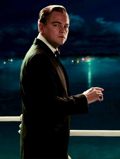 This picture of Gatsby represents when he would go to his dock and look across the bay at the green light where Daisy is. The Great Gatsby Leonardo Dicaprio, The Great Gatsby Green Light, Gatsby Green Light, The Great Gatsby Movie, Gatsby Movie, The Great Gatsby 2013, Jay Gatsby, Dark Water, Gatsby Theme