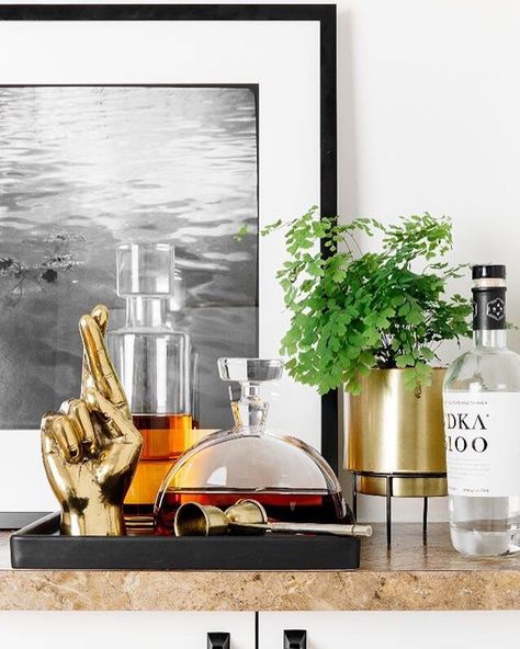 Spotted: our Brass Fingers Crossed sitting sassy in the incredible small-space makeover by Jeremiah Brent for Decorist| CONSORT Interior Design Inspiration and Decor. Ashtray, brass skull, and side table Apartment In Nyc, Bandeja Bar, Casa Loft, Small Space Living Room, My Apartment, Home Bar Decor, Nyc Apartment, Easy Home Decor, Living Room Makeover