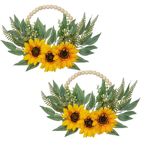 PRICES MAY VARY. Floral Door Wreaths - You will receive two artificial floral greenary wreaths. The flower wreaths will be the unique wall/window decor ornaments for farmhouse/living room/bedroom/nursery. Natural color always adding fresh and natural atmosphere to your home Unique Design - Consists of three sunflowers and some eucalyptus leaves and fern leaves as accents. Delightful and vibrant color, vivid natural form, giving artistic romantic feelings. The exquisite and unique design is perfe Sunflower Wreaths For Front Door, Boho Farmhouse Wall Decor, Farmhouse Wreaths For Front Door, Wood Bead Wreaths, Bead Wreaths, Winter Wreaths For Front Door, Sunflower Names, Sunflower House, Farmhouse Wreaths