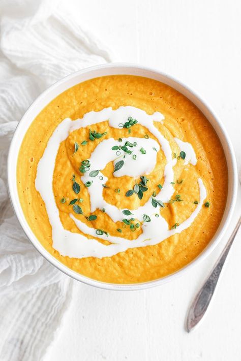 This tasty creamy carrot soup recipe comes together in under 1 hour and is finished with fresh herbs and crème fraiche for an unbelievably elegant simple soup. Cream Carrot Soup, Carrot Bisque Soup, Carrot Soup No Cream, Carrot Ginger Bisque Soup, Creamy Carrot Ginger Soup, Cream Of Carrot Soup, Creamy Carrot Soup, Carrot Cream, Carrot Soup Recipes