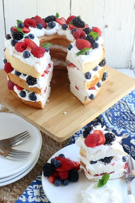 This showstopping Angel Food Cake with Berries takes ONLY 15 minutes to put together! WOW your guests with this amazing and delicious 4th of July Cake Idea or serve for any occasion! Angel Food Cake With Berries, Fourth Of July Cake, Cake With Berries, Goat Cheese Dip, Patriotic Cake, Fourth Of July Cakes, Baked Goat Cheese, Honey Glazed Ham, 4th Of July Cake