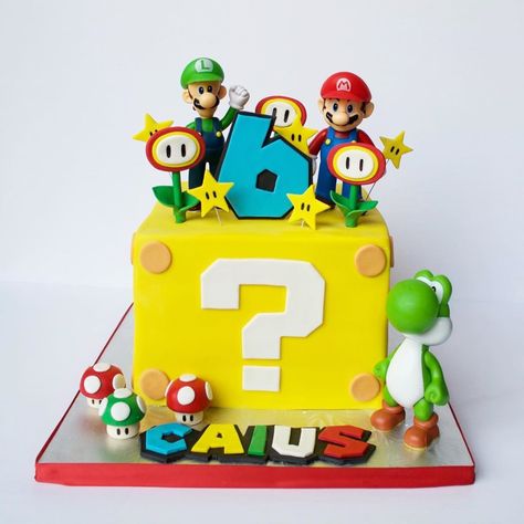 Looking for Super Mario Cake Designs? We list 15 insanely cute Mario birthday cakes that are perfect for your themed party. Take a look, you will find a couple that you will absolutely love Super Mario Torte, Luigi Cake, Bolo Do Mario, Super Mario Bros Party Ideas, Mario Kart Party, Mario Bros Birthday Party Ideas, Bolo Super Mario, Mario Birthday Cake, Mario Bros Cake