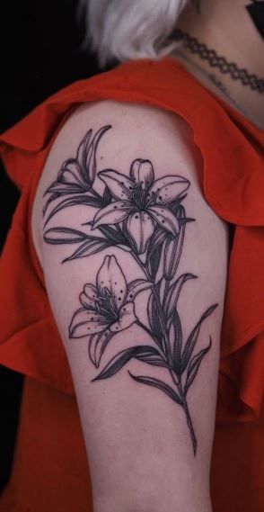 Lily Tattoo American Traditional, Blackwork Lily Tattoo, Single Lilly Tattoo, Tiger Lily Wrist Tattoo, American Traditional Lilly Tattoo, Traditional Style Lily Tattoo, Old School Lily Tattoo, Lilly’s Tattoo, Daylily Tattoo Movements