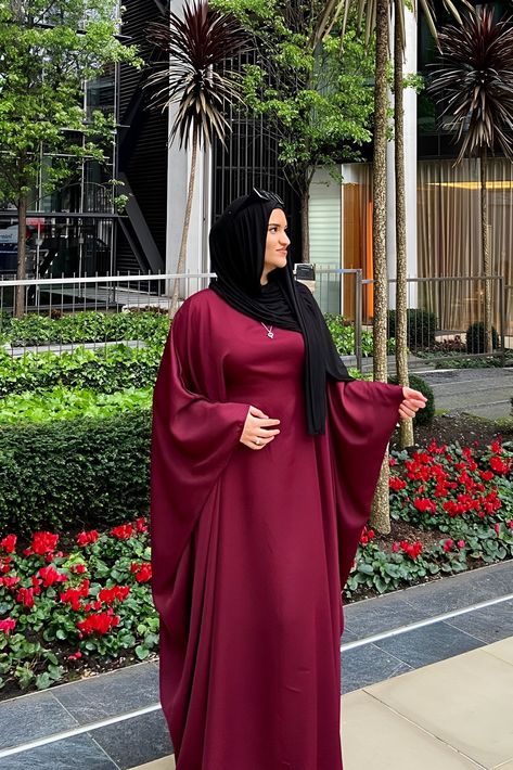 This Premium Ruby Red Butterfly Abaya makes elegance and simplicity look easy! Crafted from luxurious fabric and precision-stitched, you'll feel as comfortable as you look stunning. Every detail of this classic silhouette has been carefully considered, while its inner lining adds a timeless touch. Transform your wardrobe with this effortlessly beautiful piece!- Premium High Quality Nidha- Discreet Inner Belt (Optional)- 100% Polyester (light weight and soft)- Model is 5'7 and wears a size 58- Mo Beautiful Abaya Styles, Short Abaya Designs, Hijabi Red Dress, Abaya Styles For Women, Modest Abaya Designs, Trending Abaya Designs, Beautiful Abaya Designs, Trending Abaya, Women Kaftan Styles