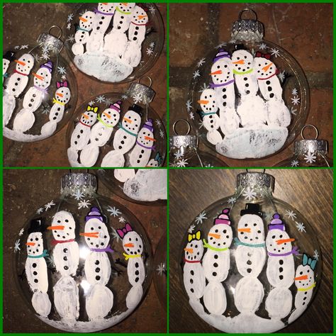 Fingerprint snowmen on clear, glass ornaments made with my daughters’ handprints :) Made by Holly Weaver. Fingerprint Snowman Ornament, Grandma Ornament Diy, Clear Ornaments For Kids, Glass Ornaments Diy Kids, Handprint Snowman Ornament, Snowman Fingerprint Ornament, Clear Ornament Crafts For Kids, Snowmen Ornaments Diy, Fingerprint Christmas Ornaments