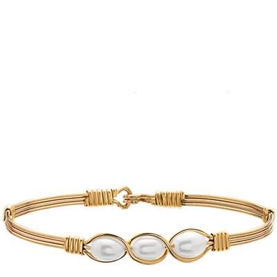 The Ronaldo Designer Jewelry Waverly Bracelet. Inspired by a young girl named Waverly who was born with the serious congenital birth defect Spina Bifida. This bracelet's main design features are three beautiful fresh water pearls, with the center pearls representing Waverly and the side pearls representing Faye, her grandmother, and Ronaldo – the people who would help look after Waverly during her lifetime.﻿ 14k Gold artist wire Sizing Guide 6.5 inches - petite 6.75 inches - small 7 inches - ave Ronaldo Bracelet, Jewelry Pottery, Lake Gifts, Spina Bifida, Mantra Bands, Bracelet Inspired, Greek Gifts, Sorority Bid Day, Paper Store