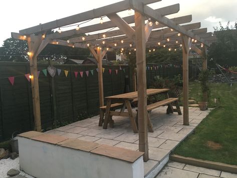 Pergola with festoon lights Festoon Lights Pergola, Event Moodboard, Pergola Lights, Canopy Ideas, Townhouse Garden, Festoon Lights, Lighting Layout, Wooden Terrace, Small Patio Garden