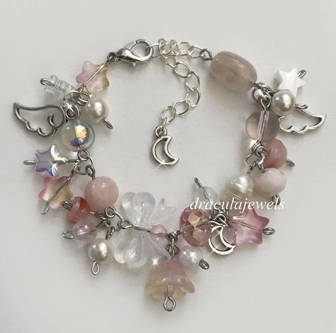 Fairy Bracelet Aesthetic, Cluttered Bracelets, Clutter Jewelry, Clutter Bracelet, Charm Bracelet Ideas, Charm Bracelet Diy, Fairy Bracelets, Bracelet Business, Pink Beaded Bracelet