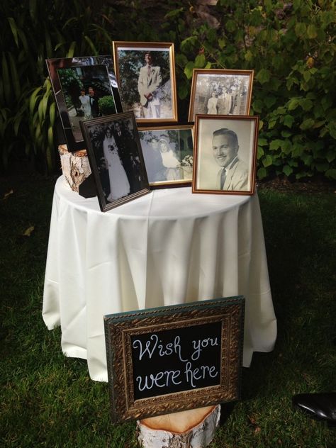 A simple and sweet DIY way to remember deceased loved ones. #wedding #weddingceremony #memorial Romantic Backyard, Wedding Photo Display, Boda Diy, Backyard Weddings, Rustic Wedding Decorations, Peacock Wedding, Future Wedding Plans, Cute Wedding Ideas, Wedding Cake Designs