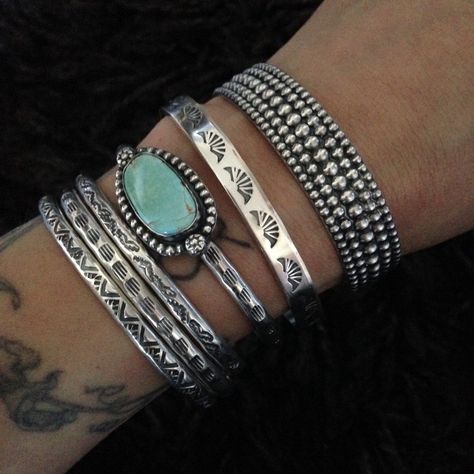 "These solid sterling silver stacker cuffs come in a set of three. They are hand stamped with geometric designs. The bracelets are then oxidized (darkened) and polished to bring out the stamping. These rustic cuffs are sturdy and comfortable to wear. The cuffs are each 4mm thick, and are 5.5\" wide with an adjustable 1\" opening. They will fit most small and medium wrists, and can be adjusted to fit by squeezing or stretching the sides. This ships in a gift box! I can also sell individual cuffs- Turquoise Jewelry Aesthetic, Western Type, Turquoise Jewelry Western, Chunky Silver Jewellery, Rodeo Jewelry, Country Jewelry, Metal Stamped Jewelry, Cowgirl Bling, Silver Turquoise Jewelry