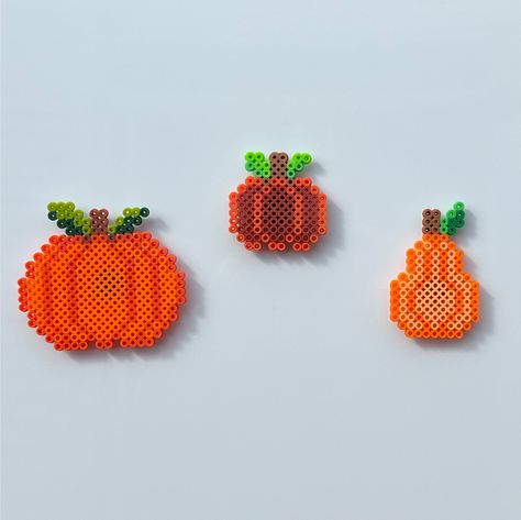 Pumpkin Patch magnets ready for Fall! Set of 3 pumpkin magnets ranging from 2.5"-4" Pearl Beads Pattern Magnets, Pumpkin Bead Pattern, Pumpkin Pearler Bead, Fall Pearler Beads Ideas, Fall Melty Beads, Melting Beads Ideas Halloween, Pumpkin Hama Beads, Autumn Perler Bead Patterns, Pumpkin Perler Bead Patterns