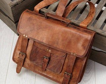 https://www.etsy.com/in-en/listing/956604903/genuine-leather-laptop-bagsleather?ref=shop_home_active_1&pro=1&frs=1 Vintage Leather Backpack, Backpack Vintage, Ear Cleaner, Leather Laptop Backpack, Brown Leather Satchel, Satchel Backpack, Handbags Luxury, Leather Laptop Bag, Leather Satchel Bag