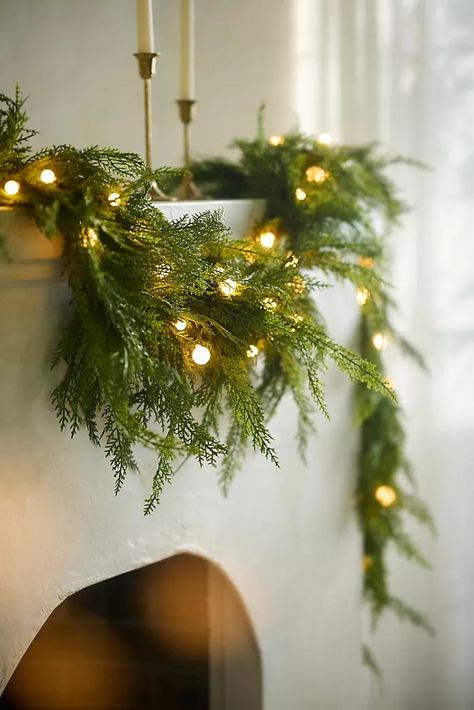 Holiday Décor, Ornaments, Gift Wrap & More | Anthropologie Mantle Decorated For Christmas, Farm Fresh Christmas Tree Decor, Traditional Farmhouse Christmas Decor, Christmas Wall Art Living Room, Christmas Holiday Party Decor, Christmas Decor Arched Doorway, Christmas Wreath Lights, Classy Outside Christmas Decor, Chartreuse Christmas Decor