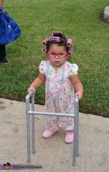 Samantha: My daughter Leila Renee. She's a clumsy little thing so I decided to make her a walker out of 1/2 pic pipe and painted it silver. Put her on a... Old Man Halloween Costume, Kids Old Lady Costume, Old People Costume, Old Lady Dress, Toddler Dress Up, Old Lady Costume, School Costume, School Dress, Dress Up Day