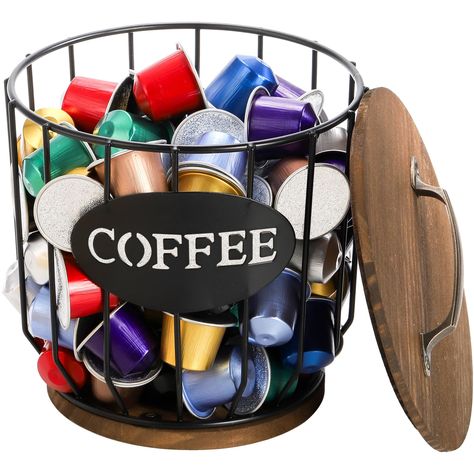 PRICES MAY VARY. Yarlung black wire coffee pod holder with rustic wooden lid and base, wide mouth 6.3"D x 7"H, 5.1inch base, take up less countertop area to organize coffee pods, coffee filters and more. Large Capacity: Store 30 K cups, 30-40 coffee pods or instant coffee, 80 original capsules, or 500pcs coffee filters. Create a neat and tidy coffee bar corner for you. Metal Wire Construction: Classic round shape coffee filter organizer is durable and not easily deformed, anti-corrosion, a weigh Bar Corner, Coffee Filter Holder, Coffee Pod Holder, Storage Baskets With Lids, Coffee Storage, Coffee Capsules, Coffee Filters, Coffee Filter, Coffee Station