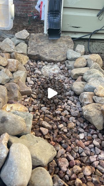 Rock Pond Landscaping, Rock Beds For Water Drainage, Rock Gutter Drainage Ideas, Waterfall Front Yard Landscaping Ideas, Rock And Sand Landscaping, Landscaping Drainage Ideas, Rocks Around Foundation Of House, Rain River Garden, Storm Drain Landscaping