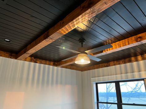 Wood And Black Ceiling, Black And Wood Ceiling, Sunroom Black Ceiling, Knotty Pine Ceiling With Beams, Black Sealing Interior, Black Tongue And Groove Ceiling, Black Ceiling With Beams, Black Wooden Ceiling, Black Ceiling With Wood Beams