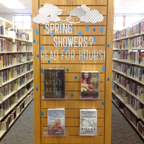 Spring showers? Read for hours! Library display, public library display Centralia Public Library, Centralia MO **no link, just pic** School Library Monthly Themes, Library Book Displays For Adults, Spring Book Display Libraries, Ya Library Displays, Library Spring Displays, Spring Library Display Ideas, Public Library Decorating Ideas, May Library Displays, Public Library Book Displays