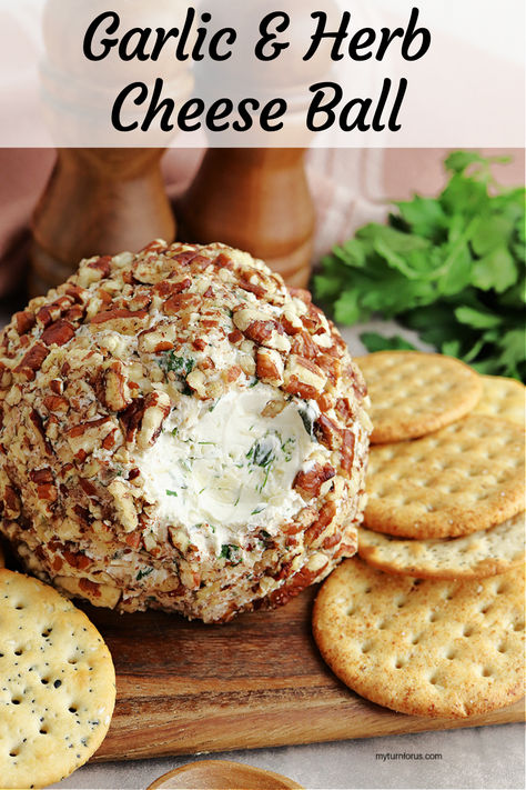 Garlic Herb Cheese Ball covered with chopped pecans. This is an easy garlic and herb cheese ball recipe which uses two cheeses and several different fresh herbs. It’s gorgeous and can be served as a game day snack, New Years Eve appetizer, or a Christmas cheese ball. #GarlicHerbCheeseBall #GarlicAndHerbCheeseBall #ChristmasCheeseBall #HerbCheeseBall #GarlicHerbCheeseBallRecipe #myturnforus Thanksgiving Appetizers Make Ahead, Cheese Ball With Pecans, Simple Cheese Ball, Herb Cheese Ball, Easy Cream Cheese Appetizers, Thanksgiving Cheese Ball, Christmas Cheese Ball, Cream Cheese Balls Recipe, Cheese Log Recipes