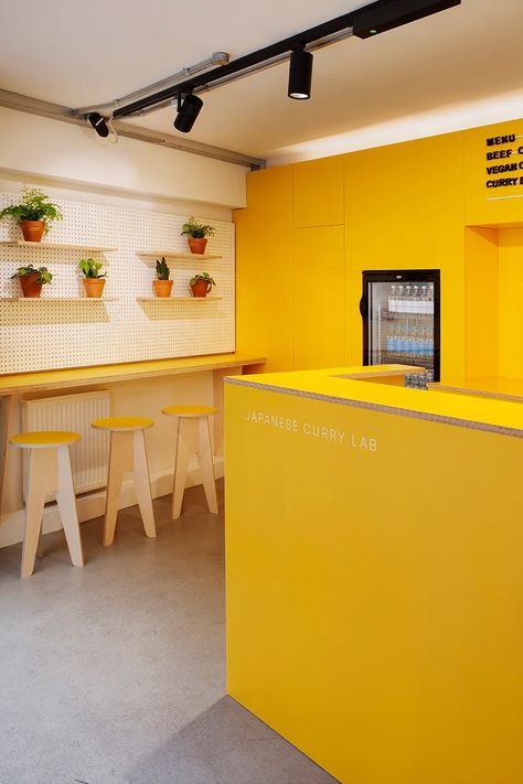 Food Hub Design, Unli Wings, Yellow Coffee Shop, Small Restaurant Interior, Yellow Restaurant, Modern Asian Decor, Interior Design Yellow, Kitchen Staging, White Restaurant