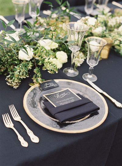 Navy inspiration: http://www.stylemepretty.com/2015/05/26/black-white-gold-outdoor-glam-wedding/ | Photography: Diana McGregor - http://www.dianamcgregor.com/ Table Setting With Greenery, Black And Gold Wedding Table, Gold Wedding Table Setting, Wedding Table Menus, Gold Table Setting, Black And Gold Wedding, Black Tablecloth, Wedding Table Setting, Black Gold Wedding