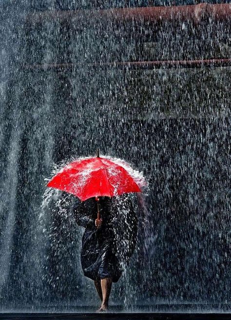 Woman holding a red umbrella & walking in the rain Christophe Jacrot, Rainy Day Photography, Fotografi Urban, I Love Rain, Umbrella Art, Red Umbrella, Rain Storm, Going To Rain, Love Rain