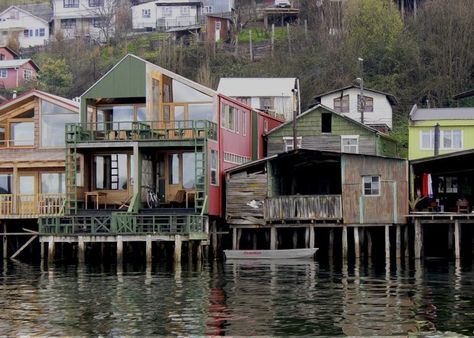 Chilean island of Chiloe - Panama Canal known for its waterfront stilt houses which have been converted into colorful hotels, coffee shops, and artisan co-ops. Stilt House, Stilt Houses, Pier House, Fishing Town, House On Stilts, Sea House, Overwater Bungalows, Panama Canal, Stilts