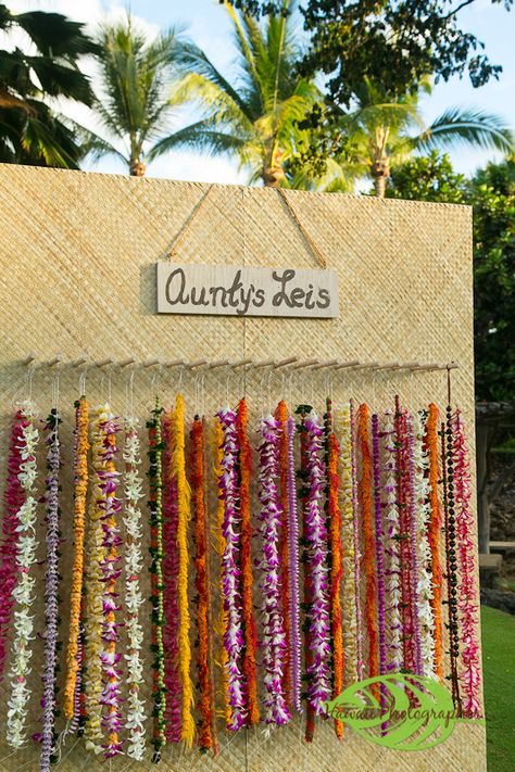 Guests were greeted with flower leis from a traditional Hawaiian lei stand and were assisted in selecting the perfect lei. Four Seasons Resort Hualalai Poly Wedding, Lei Stand, Hawaiian Wedding Themes, Pineapple Wedding, Sunset Party, Hawaiian Lei, Chocolate Bites, Luau Wedding, Fiesta Tropical